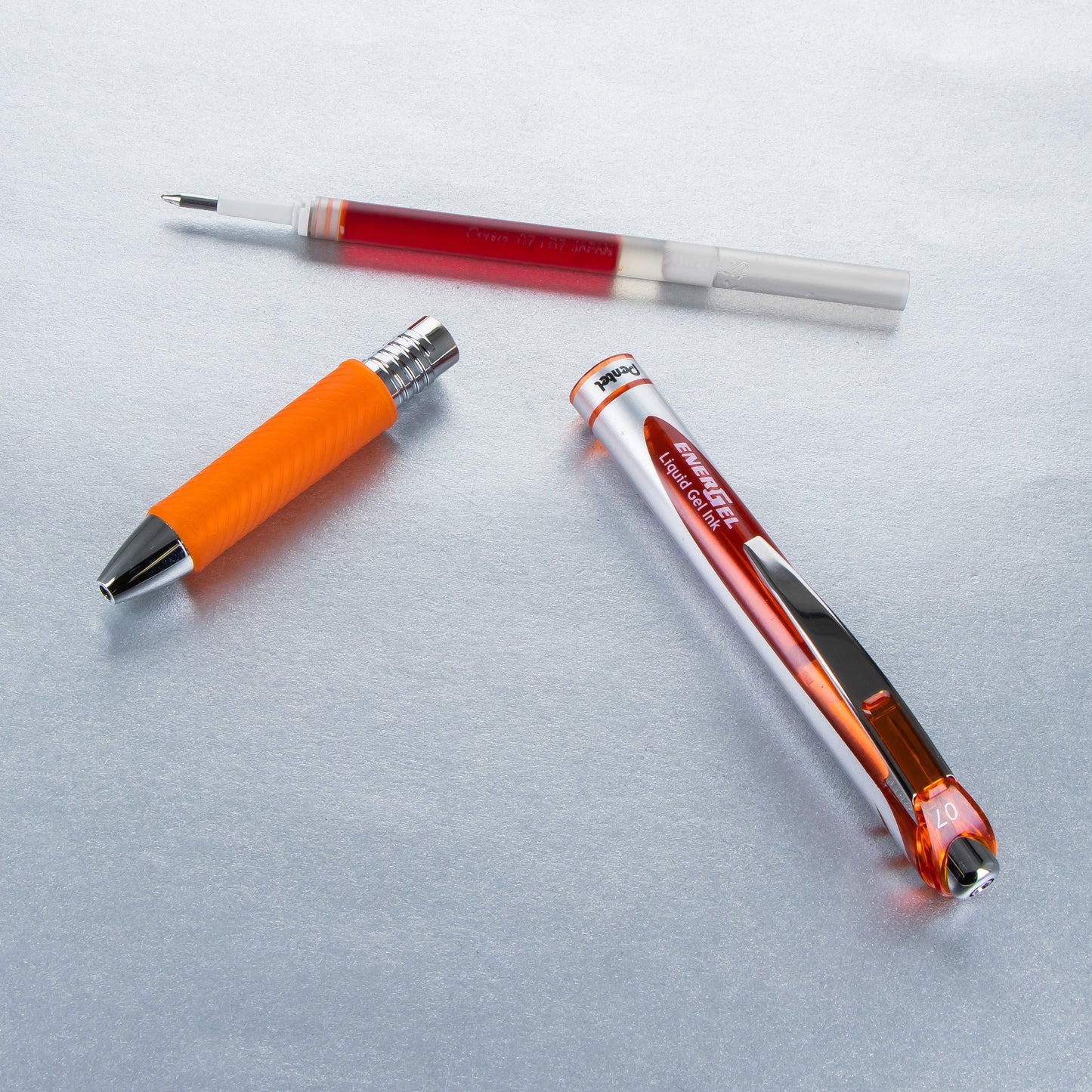 Pentel EnerGel RTX Retractable Liquid Gel Pen, (0.7mm) Metal Tip, Medium Line,Orange Ink (BL77-F)